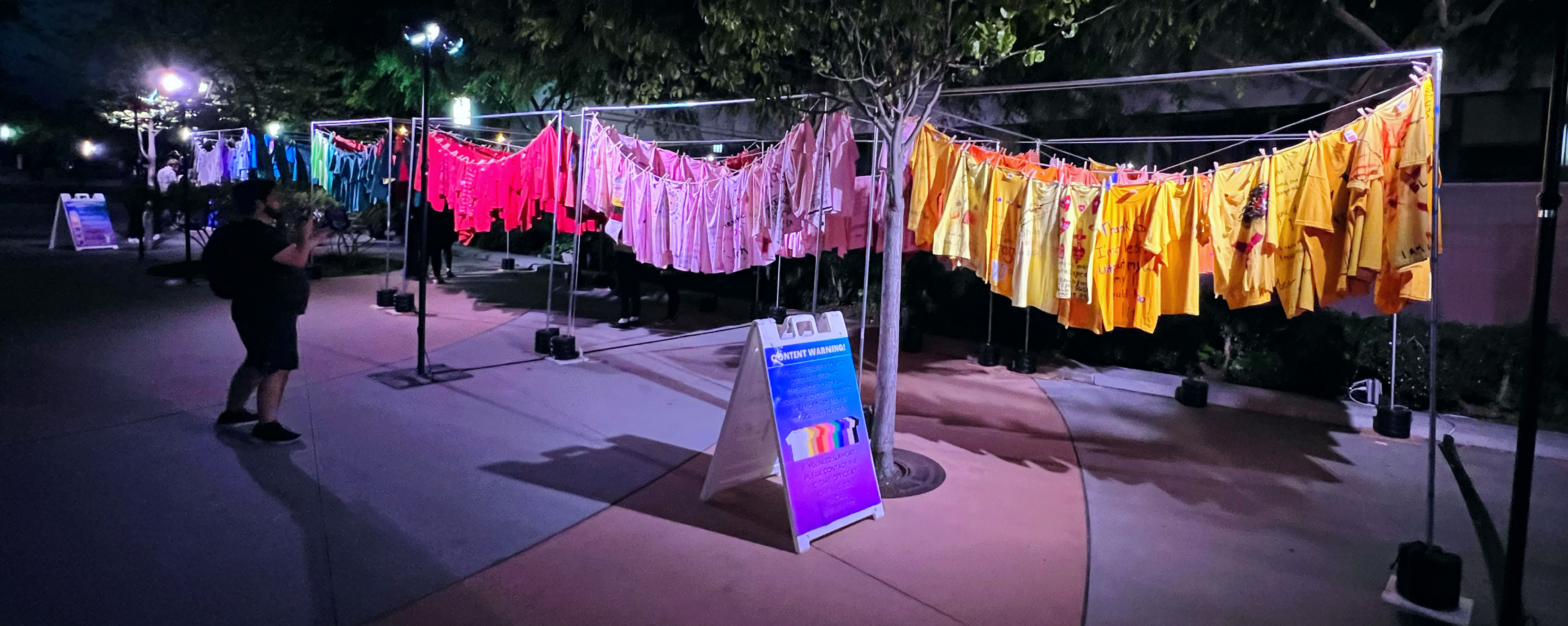 Night time Clothesline Project during Take Back the Night 2023